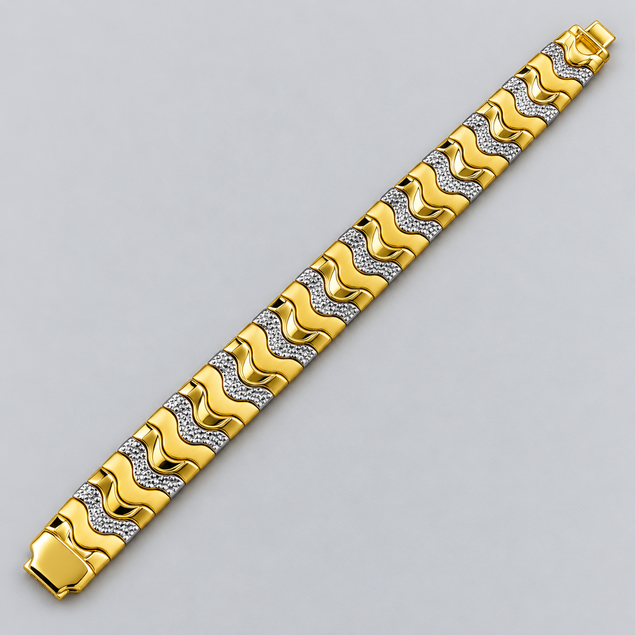 Two-Tone Gold and Silver Wave Link Bracelet with Textured Accents