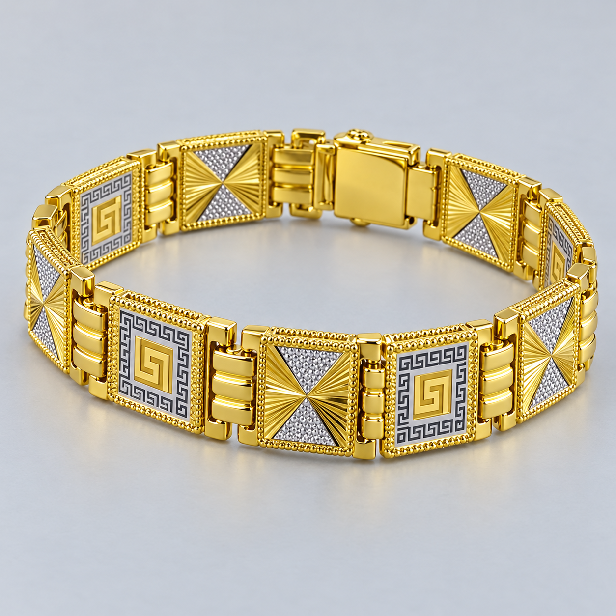 Gold-Tone Greek Key and Pavé Pinwheel Panel Link Bracelet