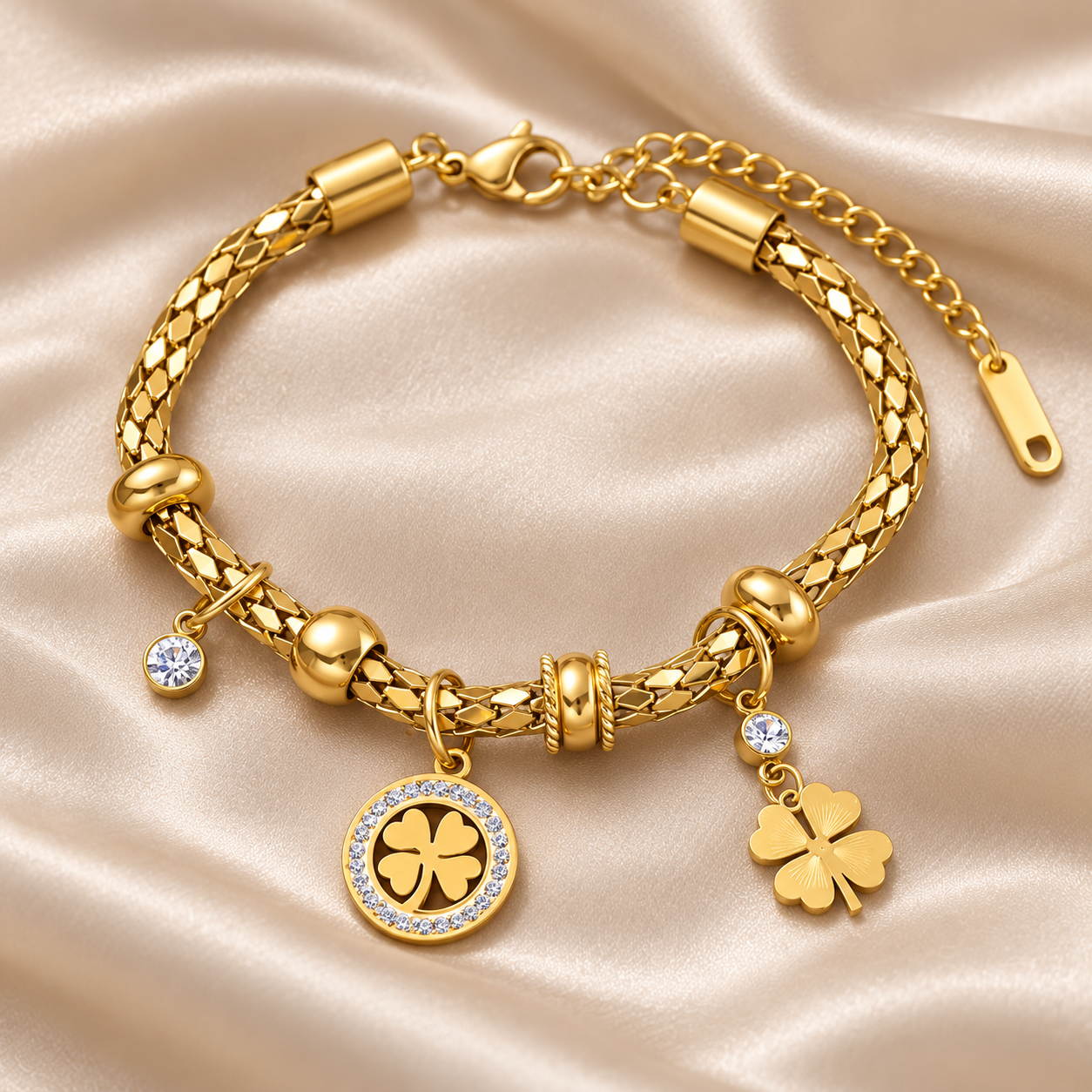 Yellow Gold-Tone Four-Leaf Clover Charm Bracelet with Clear Stones