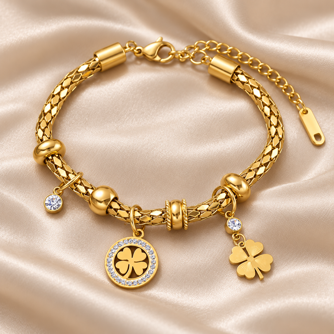 Yellow Gold-Tone Four-Leaf Clover Charm Bracelet with Clear Stones