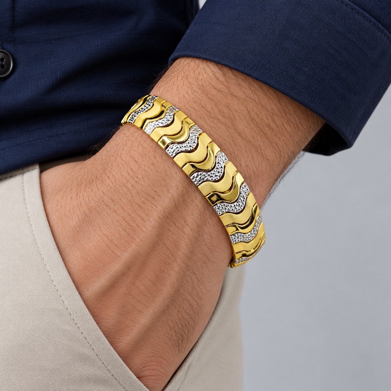 Two-Tone Gold and Silver Wave Link Bracelet with Textured Accents