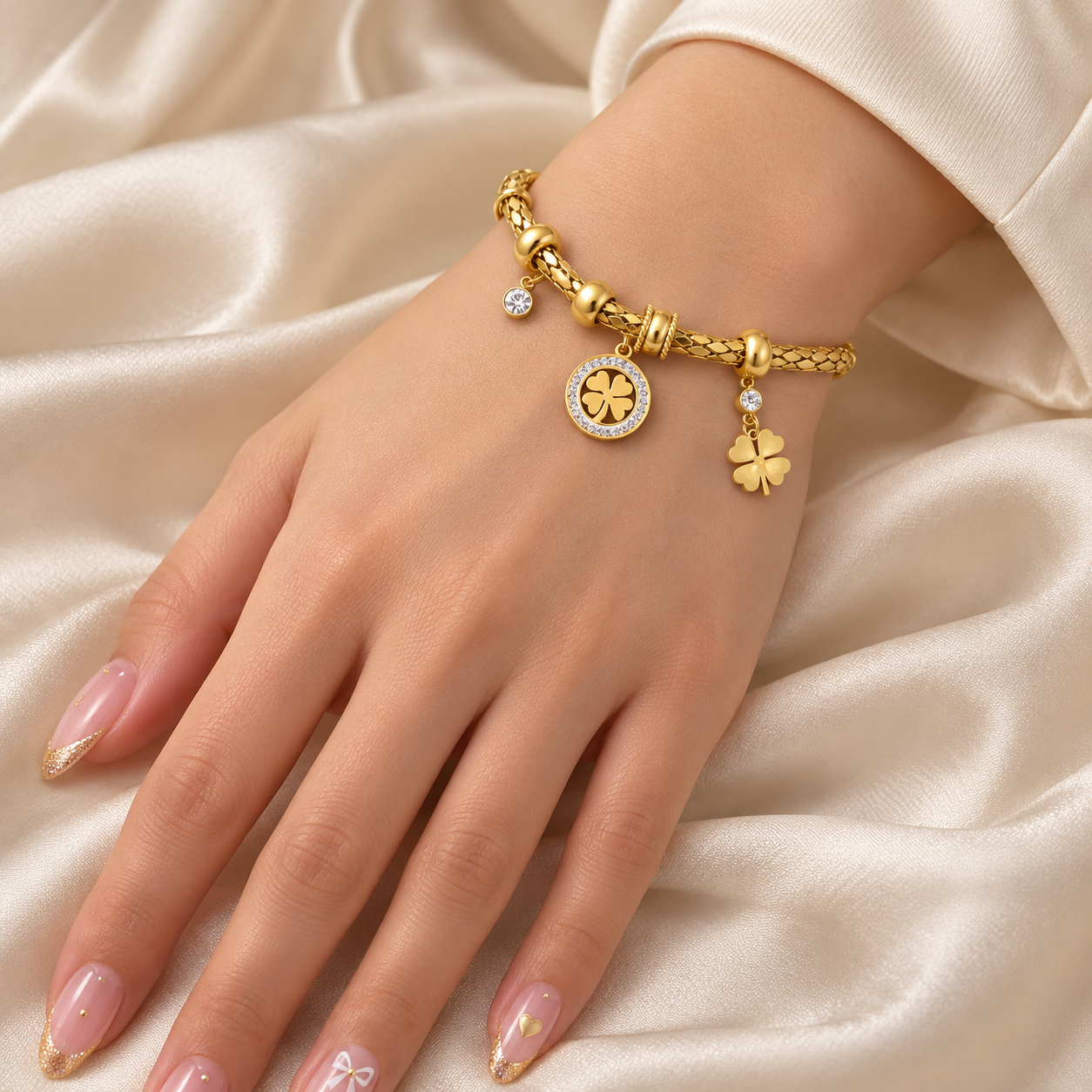 Yellow Gold-Tone Four-Leaf Clover Charm Bracelet with Clear Stones