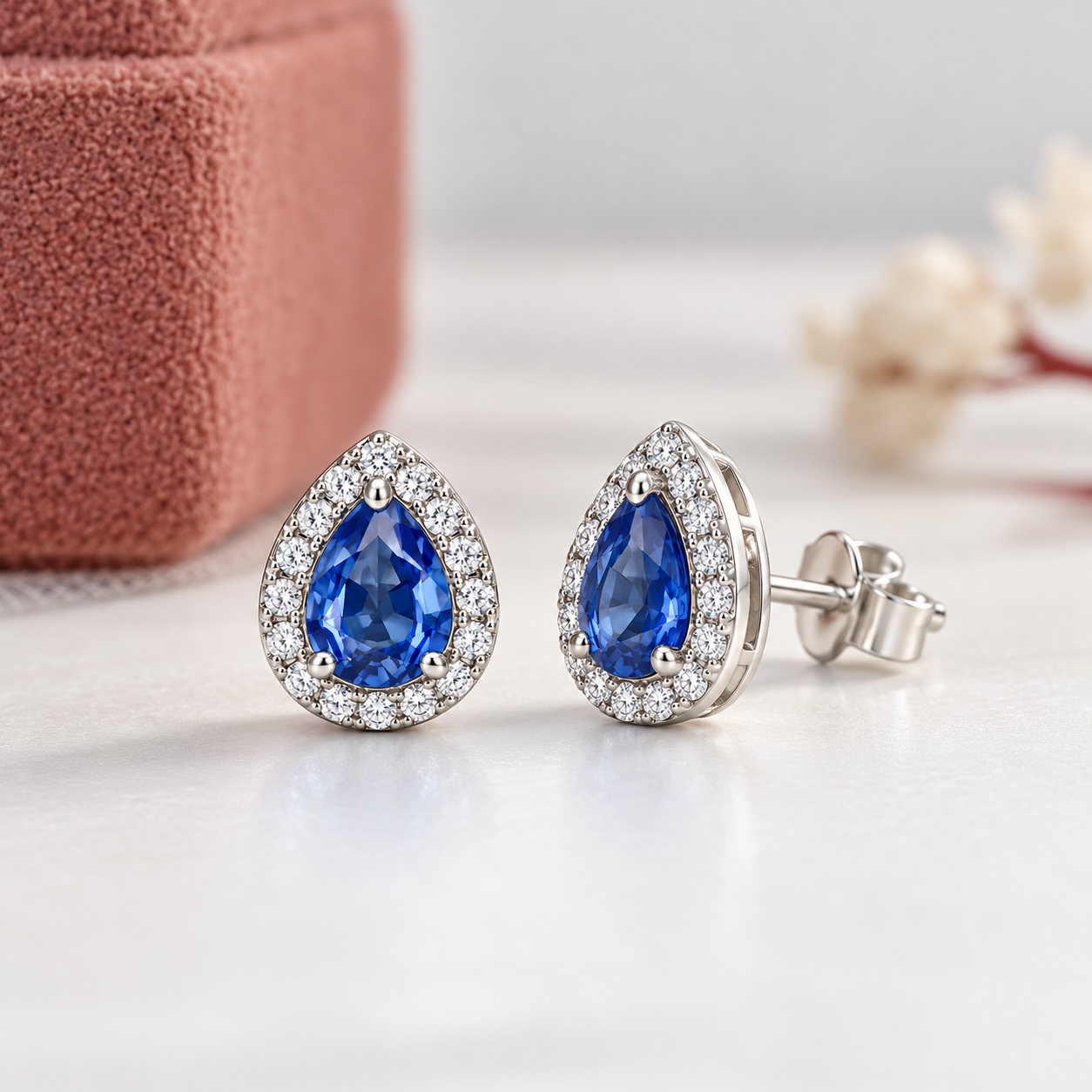 Blue Pear-Shaped Halo Stud Earrings in White Gold Tone