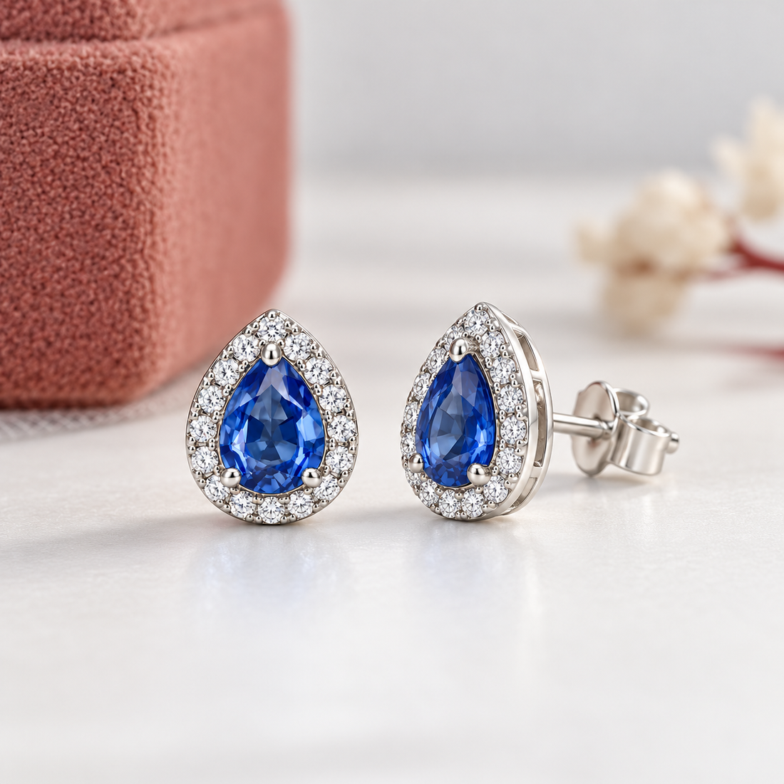 Blue Pear-Shaped Halo Stud Earrings in White Gold Tone