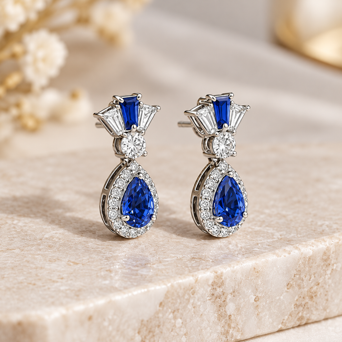 Blue Pear Halo Drop Earrings with Tapered Baguette Accents