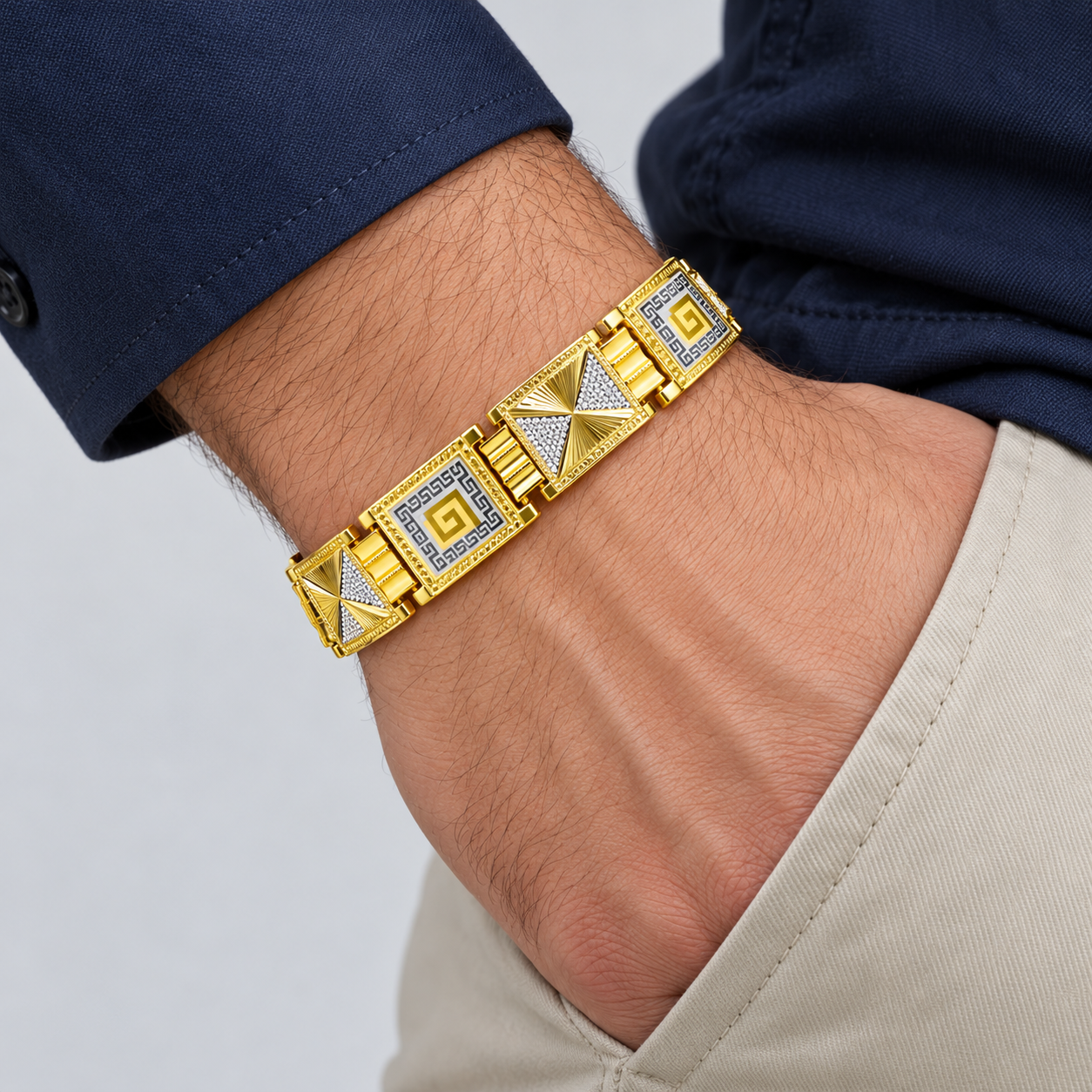 Gold-Tone Greek Key and Pavé Pinwheel Panel Link Bracelet