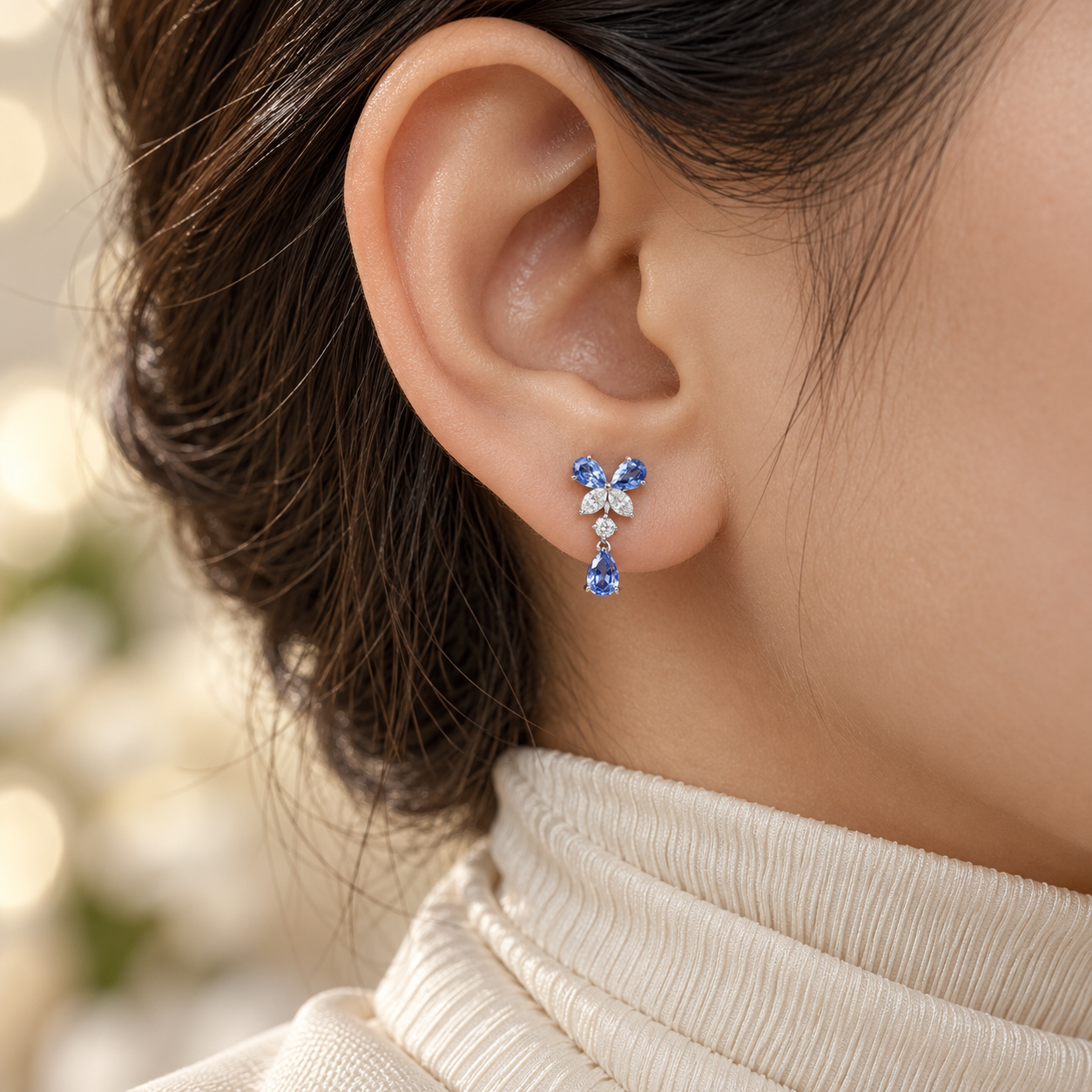 Blue Pear Drop Earrings with Butterfly Stone Cluster