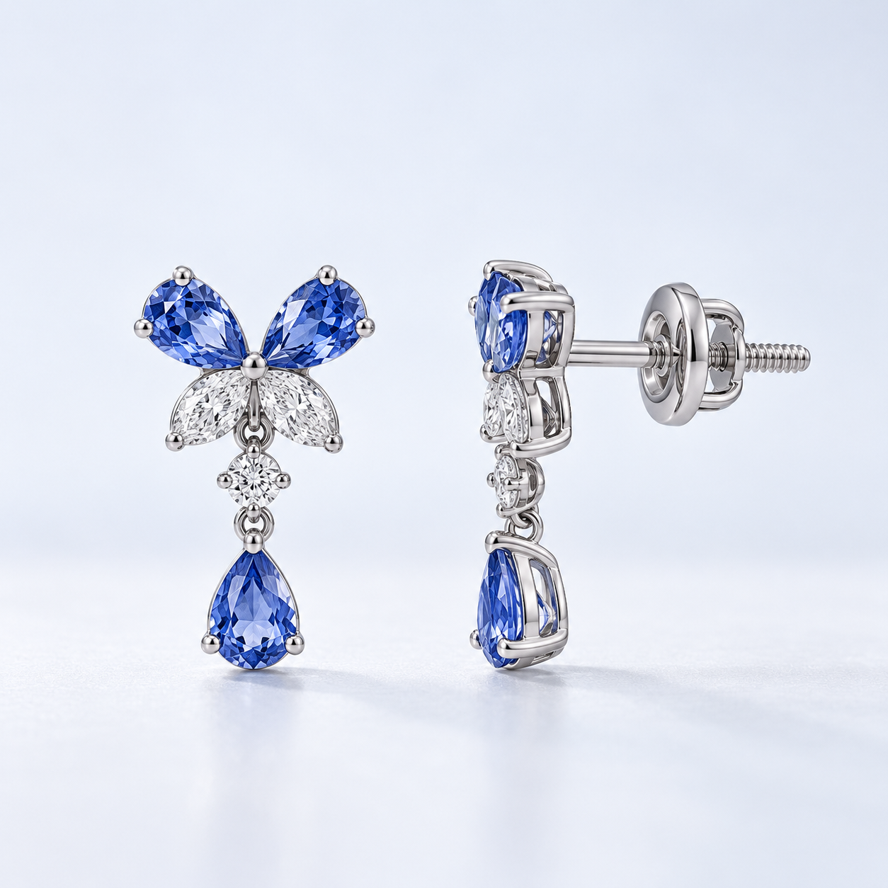Blue Pear Drop Earrings with Butterfly Stone Cluster