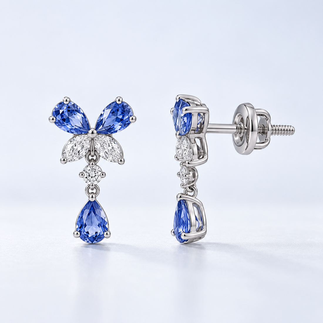Blue Pear Drop Earrings with Butterfly Stone Cluster