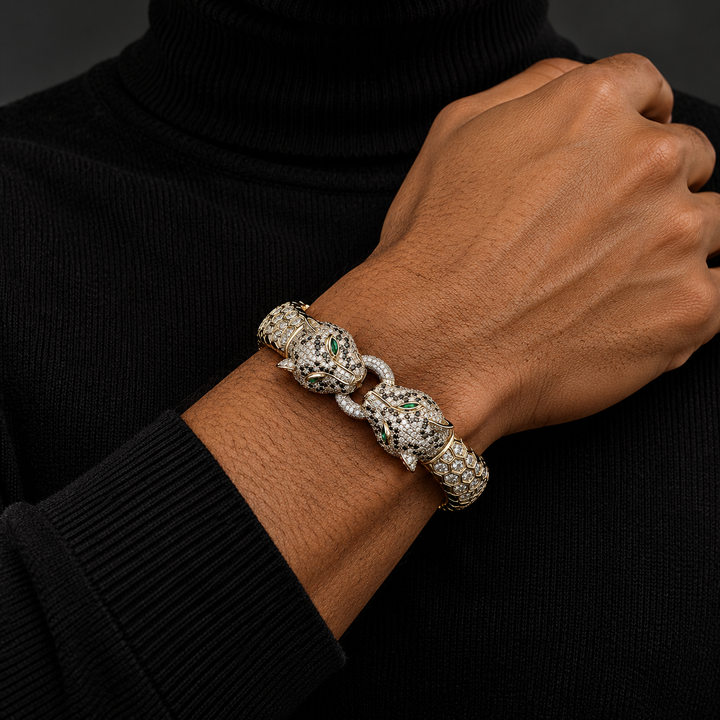 Double Panther Head Yellow Gold-Tone Bracelet with Green Eyes.