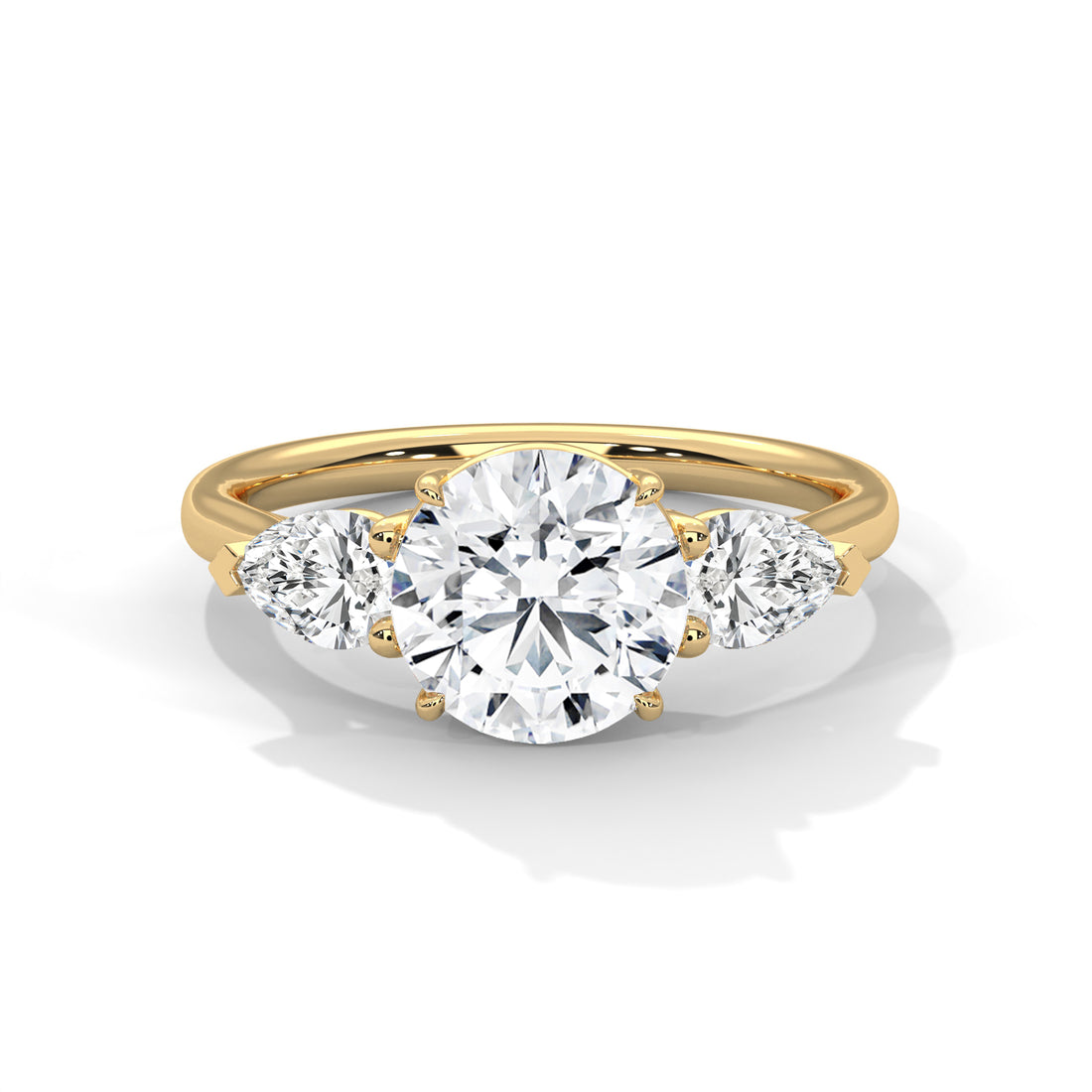 Rose Gold Round Cut Three Stone Pear Side Engagement Ring
