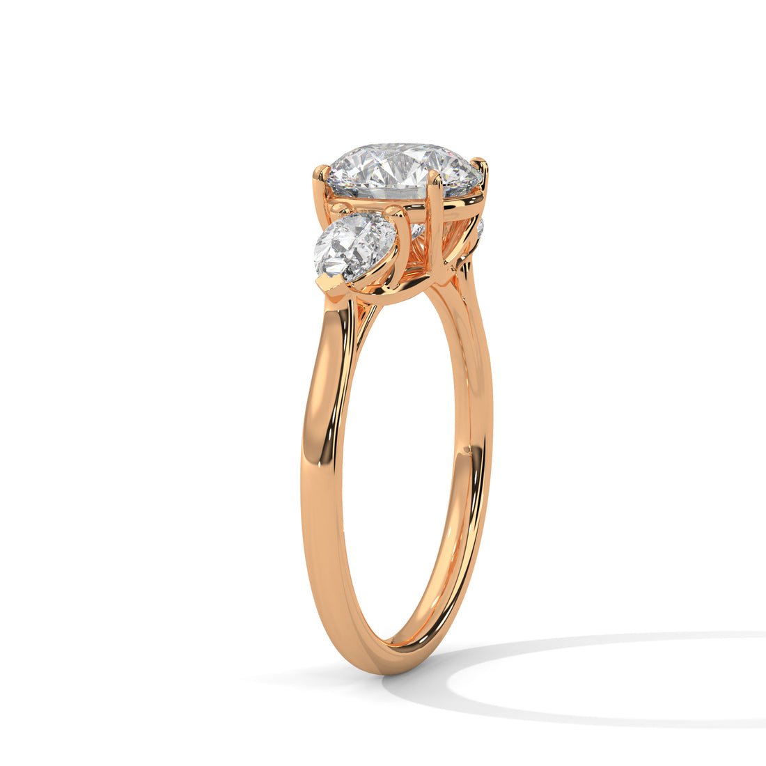 Rose Gold Round Cut Three Stone Pear Side Engagement Ring