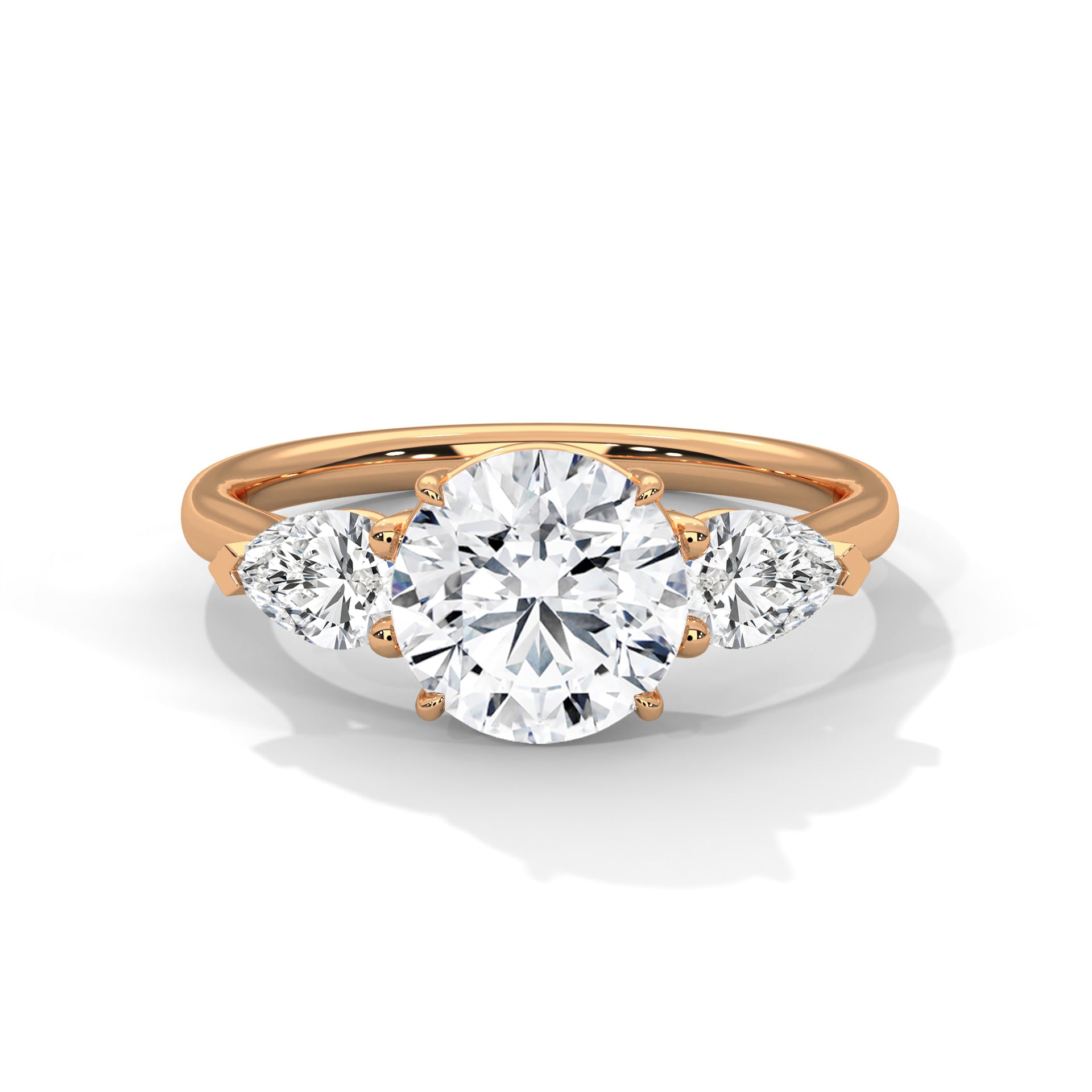 Rose Gold Round Cut Three Stone Pear Side Engagement Ring