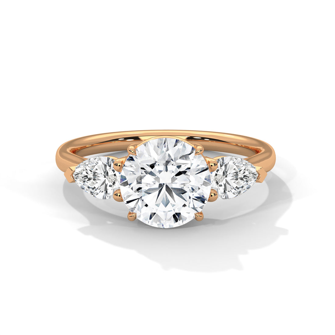 Rose Gold Round Cut Three Stone Pear Side Engagement Ring