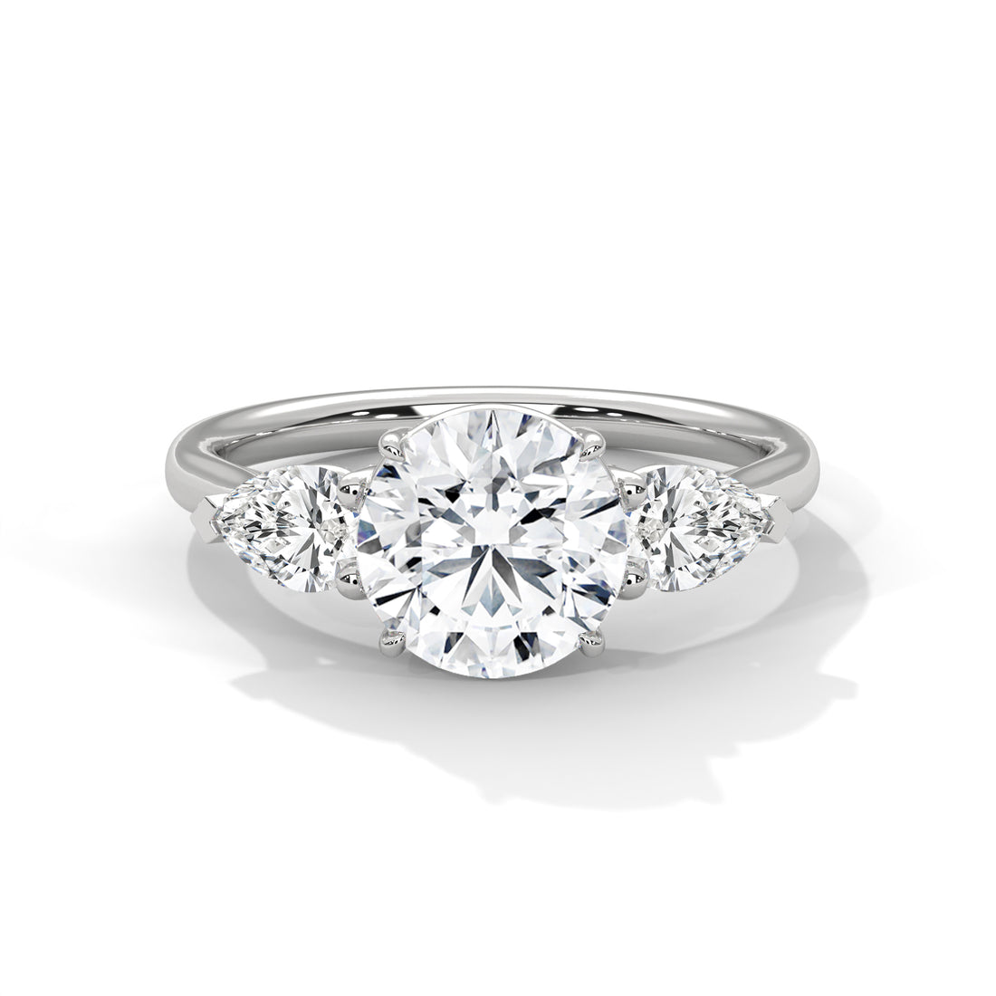 Rose Gold Round Cut Three Stone Pear Side Engagement Ring
