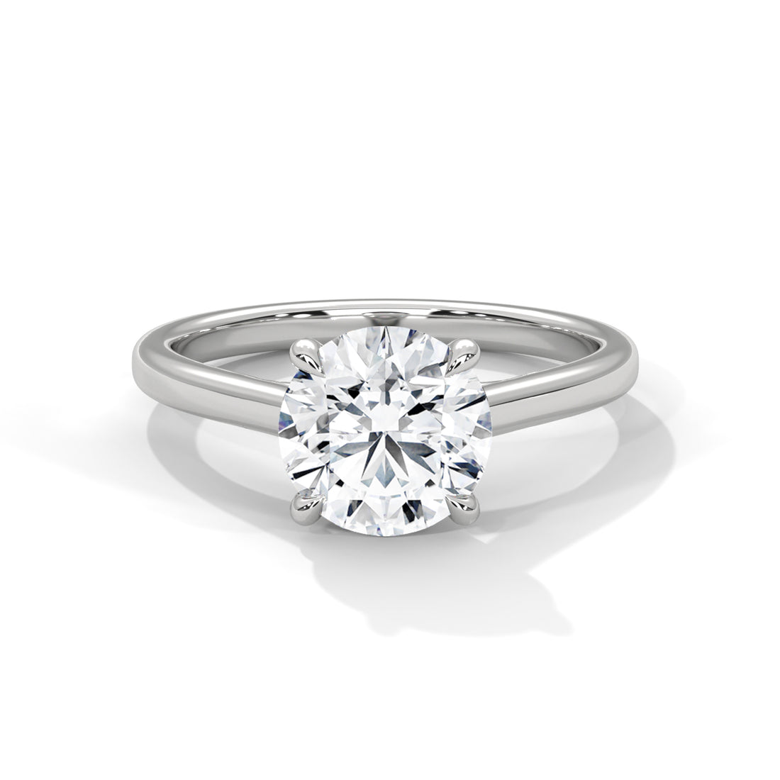 Round Cut Four-Prong Cathedral Solitaire Engagement Ring in Rose Gold
